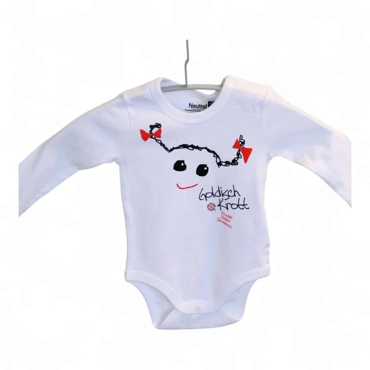Weißer Body für Babys mit einem gezeichneten Smiley mit zwei Zöpfen und einer roten Schleife | Dazu Aufschrift "Goldisch Krott" und das Logo von "Wir alle sind Mainzer"