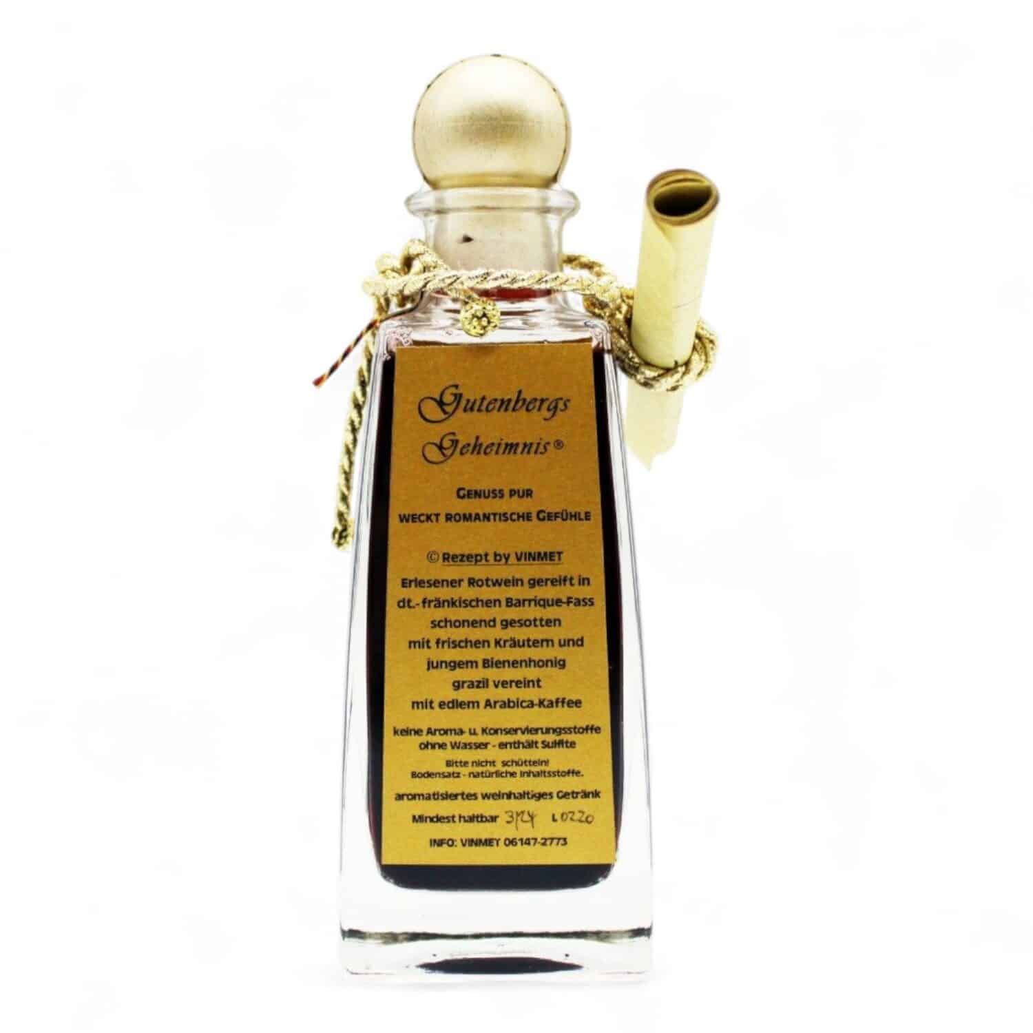 durchsichtige 200 Milliliter Flasche mit gelb/braunen Etikett, einer kleinen Schriftrolle aus Papier und Korken