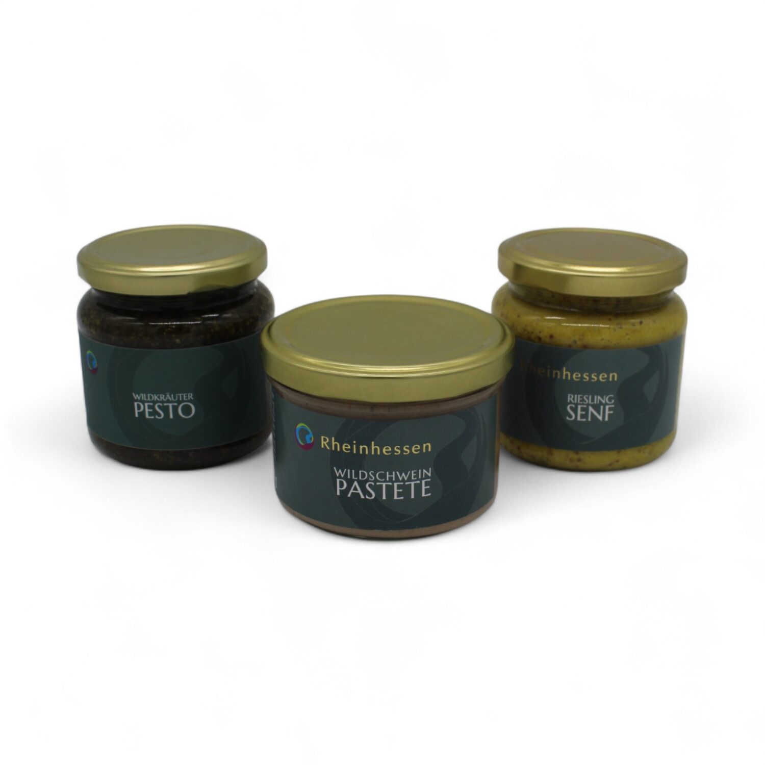 3 Gläser mit einmal Senf, Pastete und einem Pesto zusammen nebeneinander